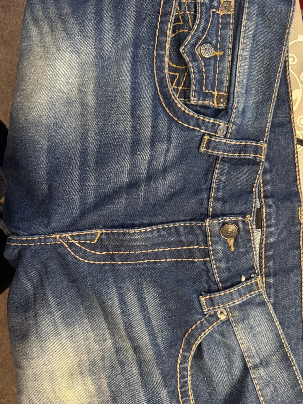 True Religion Men's Blue Denim Jeans with Contrast Stitching